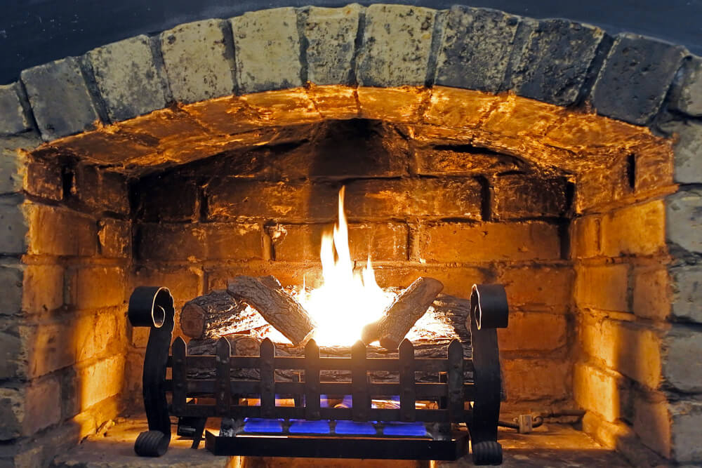 A closeup of gas fireplace embers